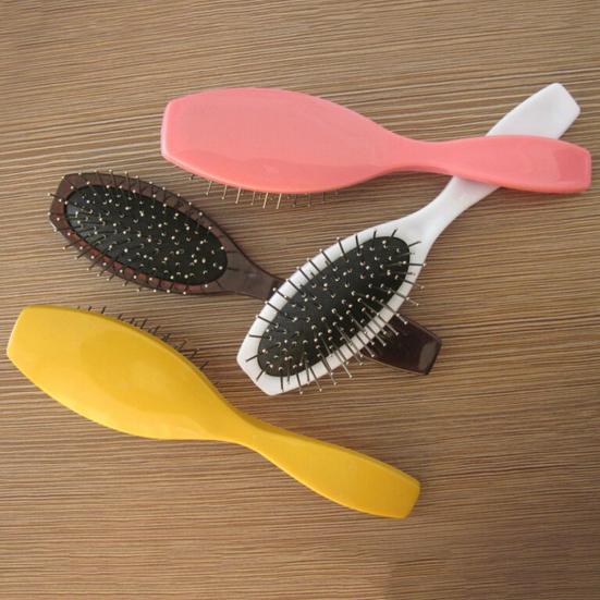 Brosse à perruque antistatique
